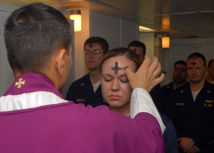080206-N-7869M-057 Atlantic Ocean (Feb. 6, 2008) Electronics Technician 3rd Class Leila Tardieu receives the sacramental ashes during an Ash Wednesday celebration aboard the amphibious assault ship USS Wasp (LHD 1).  U.S. Navy photo by Mass Communication Specialist 3rd Class Brian May (Released)